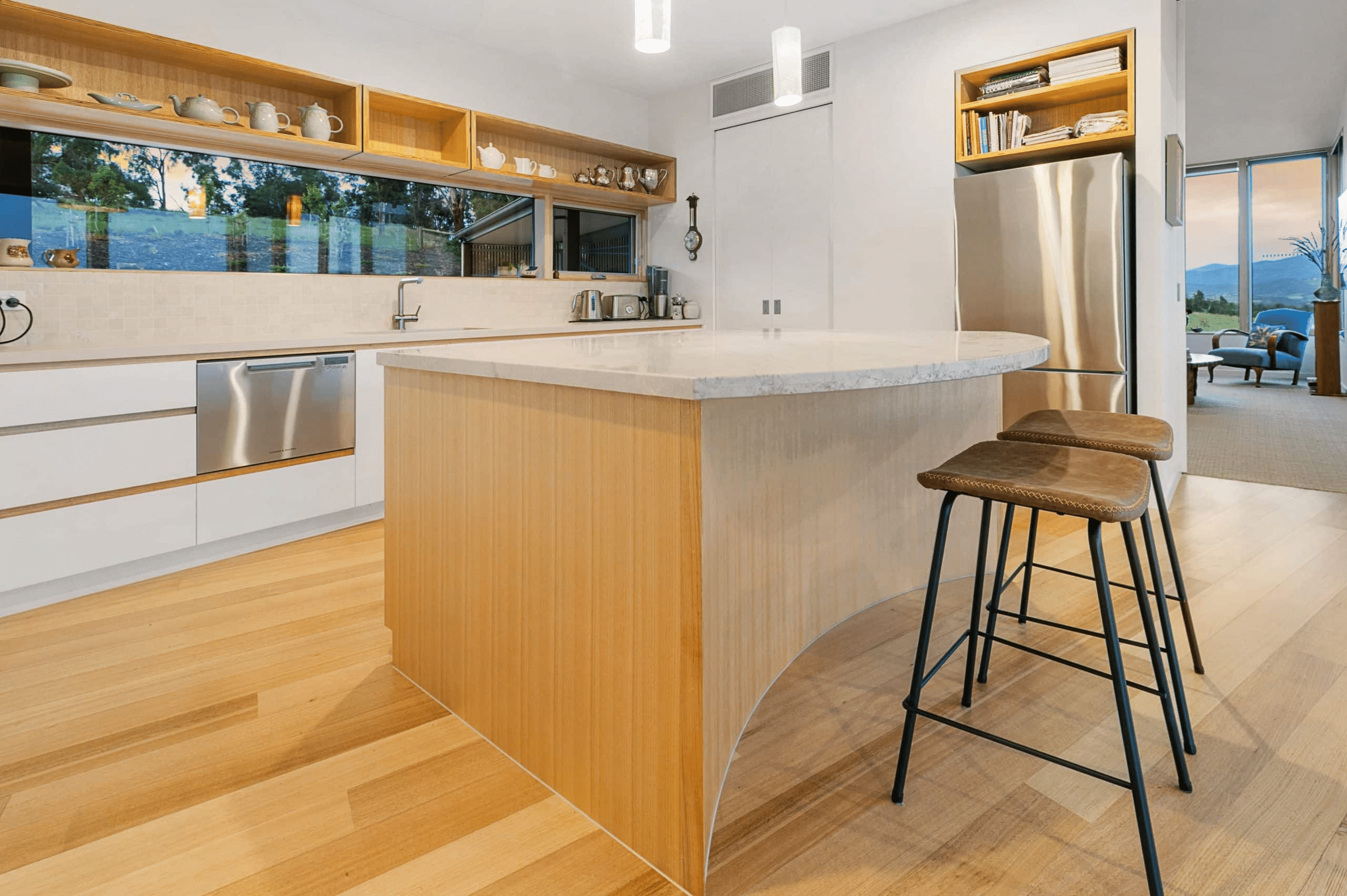 Calculator and paperwork representing building cost blowouts Australia homeowners want to avoid